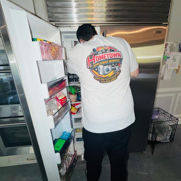 Chase repairing freezer